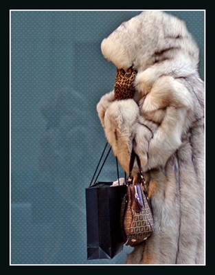 Now that I'm rich, why shouldn't I have a real fur coat?  f*** all those little animals that it took to make it.